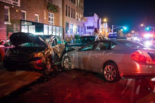 Severe car crash at night in the city close up concept