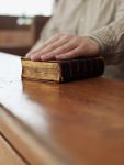 hand on bible in court